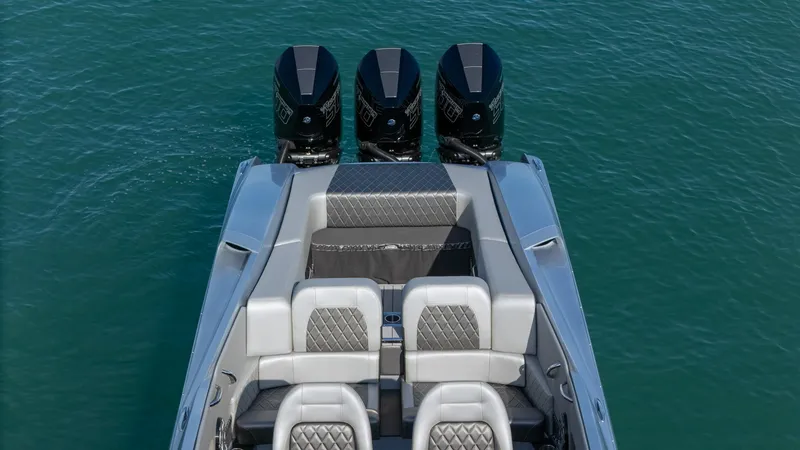 Slide: The Image of 2017 Nor-Tech 3900 Super-VEE boat with triple engines on blue water. - 45