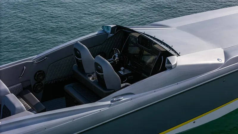 Slide: The Image of 2017 Nor-Tech 3900 Super-VEE boat interior with sleek design on water. - 46