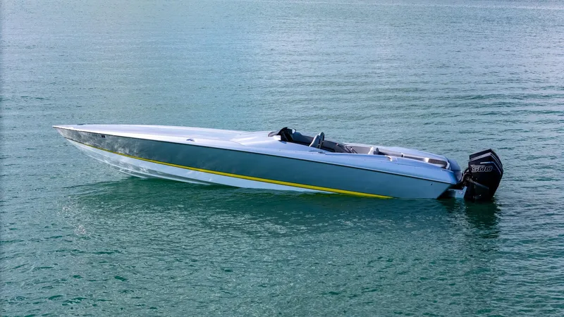 Slide: The Image of 2017 Nor-Tech 3900 Super-VEE speedboat on calm water. - 7