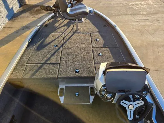 Slide: The Image of 2025 Vexus AVX1880 fishing boat interior with steering console and seating. - 3