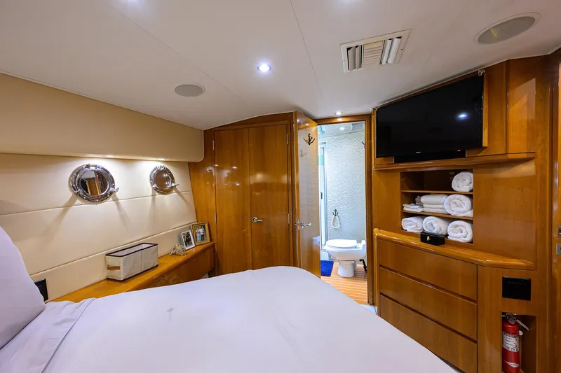 Slide: The Image of Luxurious cabin interior of 2001 Hatteras 60 Convertible yacht with ensuite bathroom. - 21