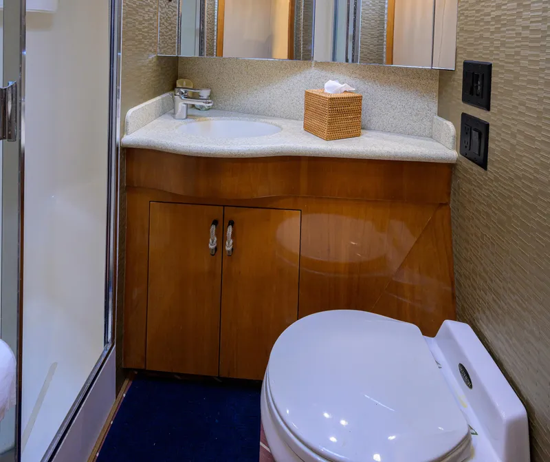 Slide: The Image of Bathroom interior of 2001 Hatteras 60 Convertible yacht with shower and vanity. - 37