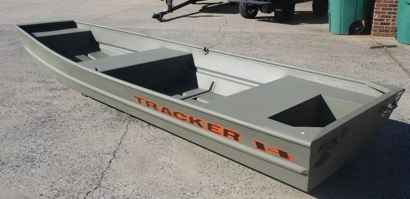Slide: The Image of 2024 Tracker Grizzly® 1436 Jon boat on concrete surface. - 3