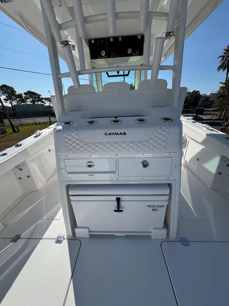 Slide: The Image of 2025 Caymas 34 CT boat interior with storage and seating. - 17