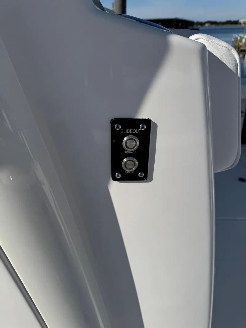 Slide: The Image of Close-up of 2025 Caymas 34 CT boat control panel. - 27