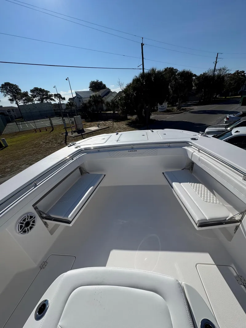 Slide: The Image of 2025 Caymas 34 CT boat interior with spacious seating and sleek design. - 7