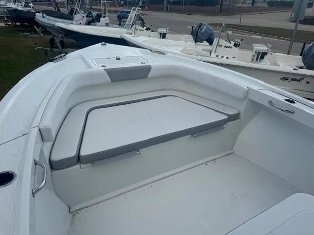 Slide: The Image of 2025 Parker 23SE Center Console boat with spacious seating area. - 21