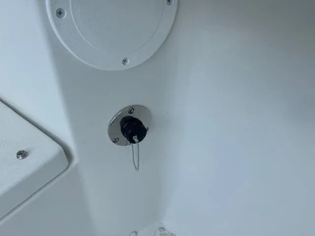 Slide: The Image of 2025 Parker 23SE Center Console boat interior detail with a fuel cap. - 9