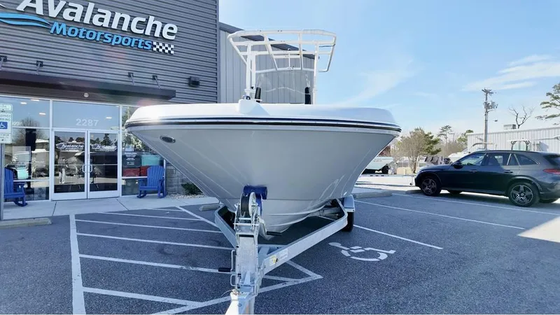 Slide: The Image of 2025 Bayliner Trophy 22 CC boat on trailer at Avalanche Motorsports. - 3