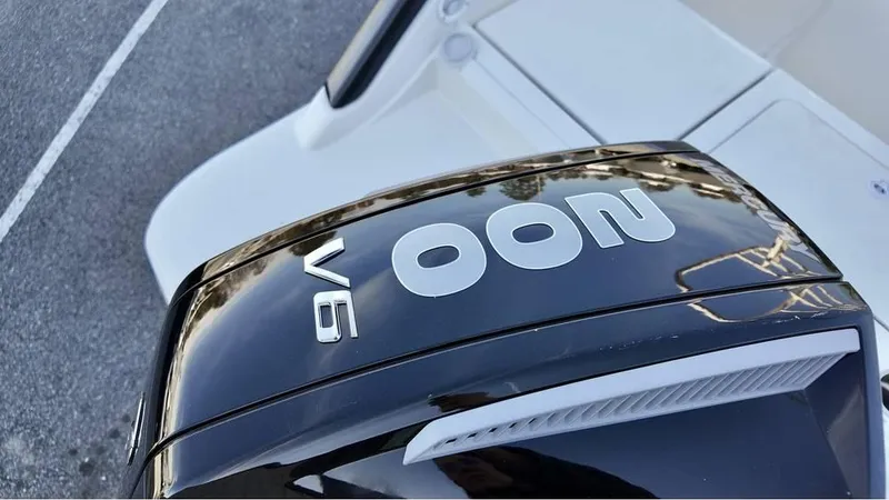 Slide: The Image of Bayliner Trophy 22 CC 2025 boat with V6 engine, top view. - 5