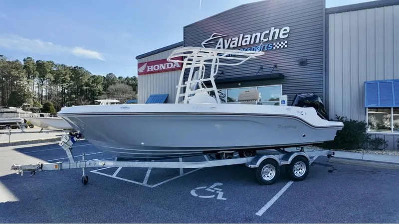 The Image of 2025 Bayliner Trophy 22 CC boat on trailer at dealership, Avalanche Motorsports. - 0