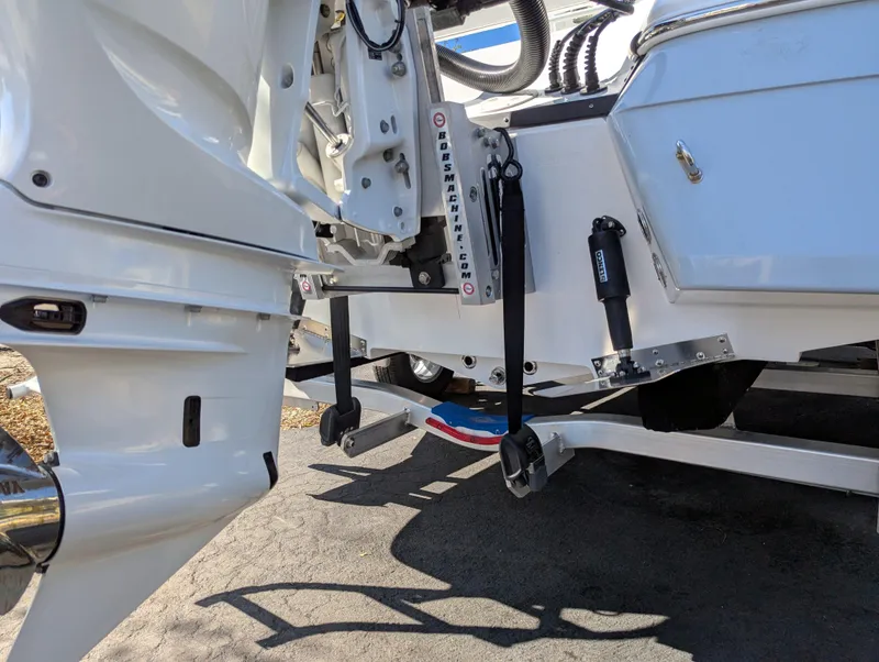 Slide: The Image of 2025 BlackJack 256 Coastal boat engine and transom detail, showcasing modern design and components. - 29