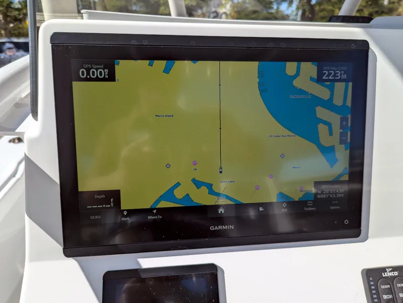 Slide: The Image of Garmin navigation display on 2025 BlackJack 256 Coastal boat dashboard. - 8