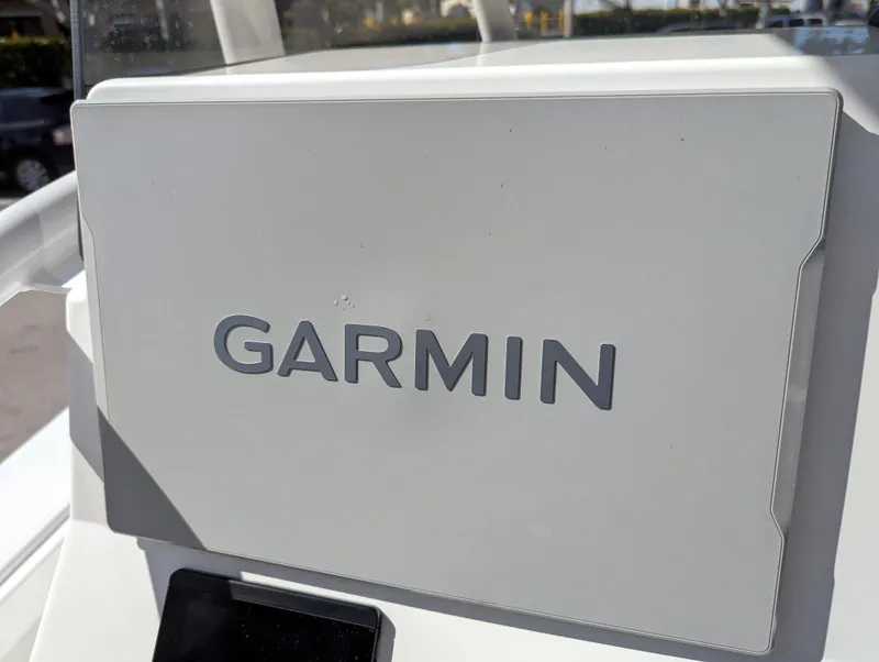 Slide: The Image of Garmin device on 2025 BlackJack 256 Coastal boat dashboard. - 9