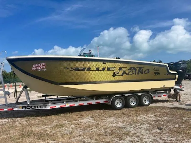 Slide: The Image of 2025 BlueCat Racing boat on trailer, fiberglass and carbon fiber model. - 9
