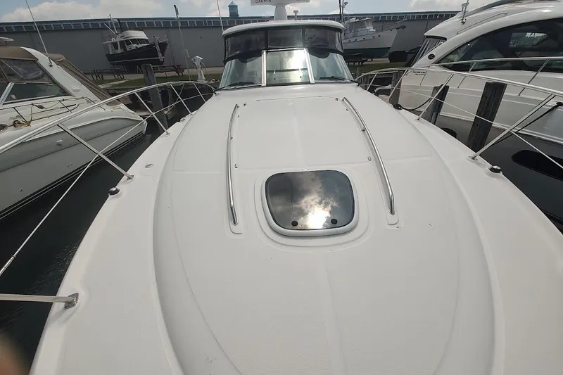Slide: The Image of 2009 Sea Ray 390 Sundancer interior with built-in mini fridge. - 14