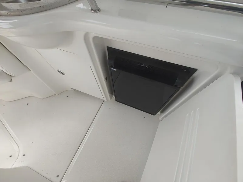 Slide: The Image of 2009 Sea Ray 390 Sundancer helm with controls and joystick. - 15