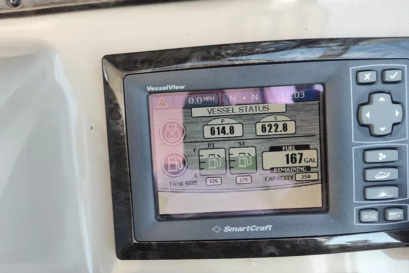 Slide: The Image of SmartCraft VesselView display on 2009 Sea Ray 380 Sundancer showing vessel status and fuel levels. - 17