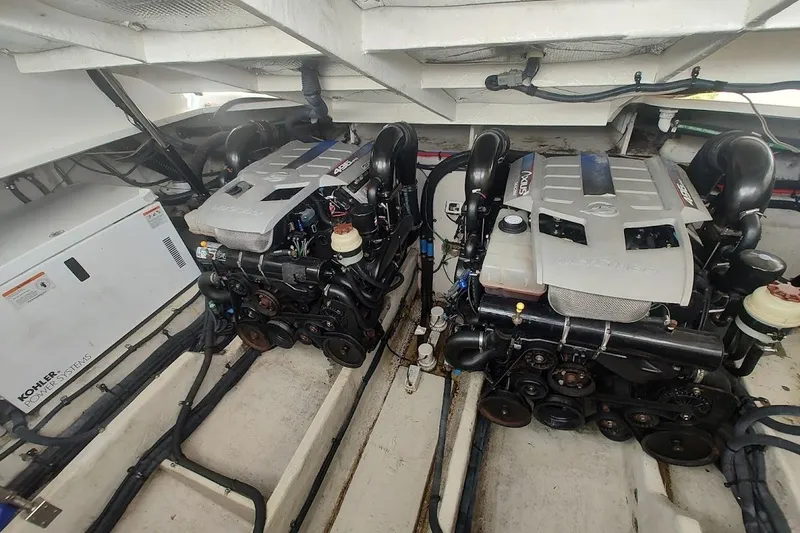 Slide: The Image of Engine room of 2009 Sea Ray 380 Sundancer with dual engines and generator. - 33