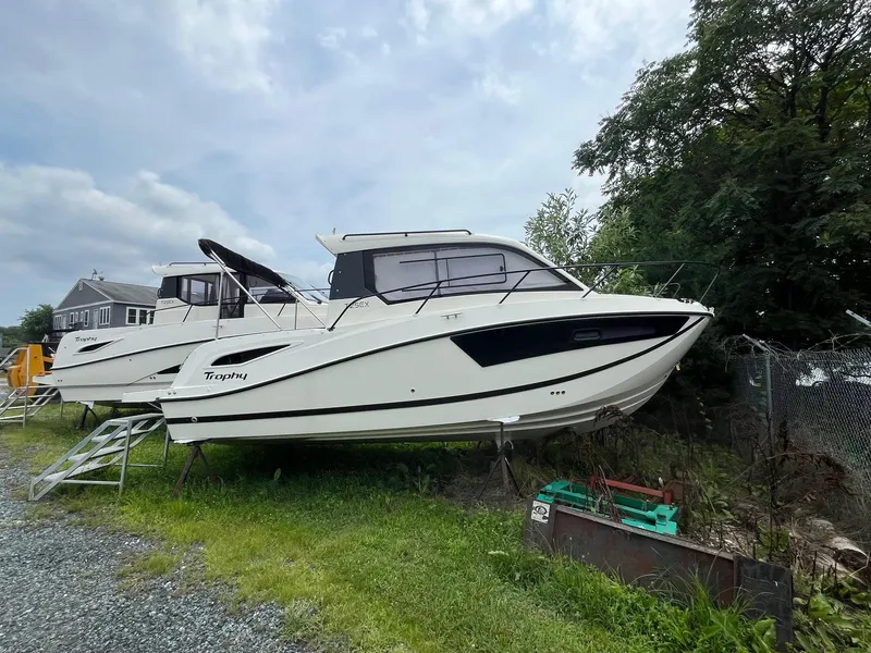 The Image of 2025 Bayliner Trophy T25 Explorer boat on display outdoors. - 1