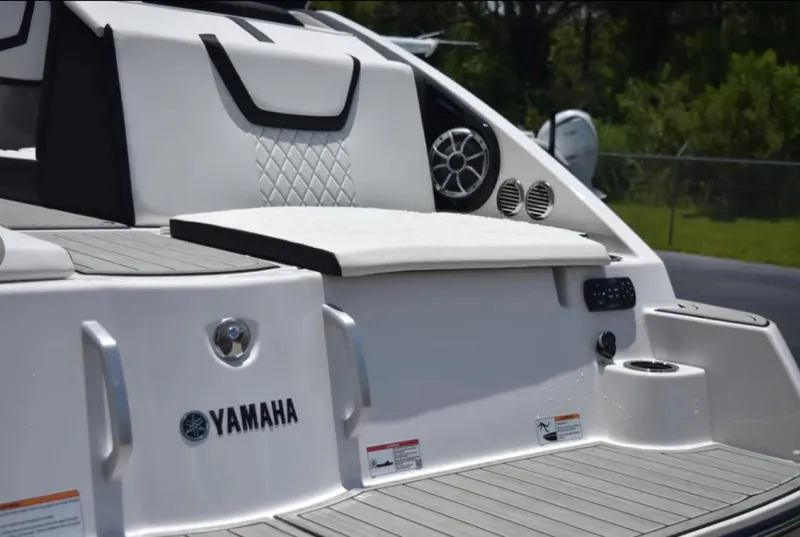 Slide: The Image of 2024 Yamaha Boats 222SD, sleek white design with comfortable seating and modern features. - 11
