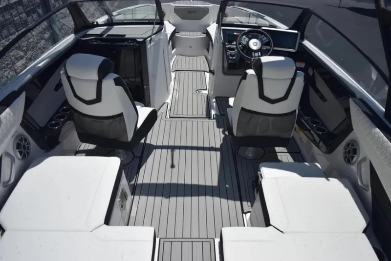 Slide: The Image of 2024 Yamaha Boats 222SD interior with sleek seating and modern dashboard design. - 9