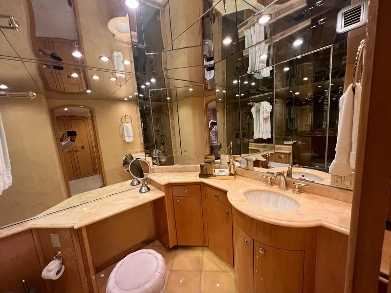 Slide: The Image of Luxurious bathroom in 2004 Hatteras 80 Motor Yacht with elegant fixtures and mirrored walls. - 33