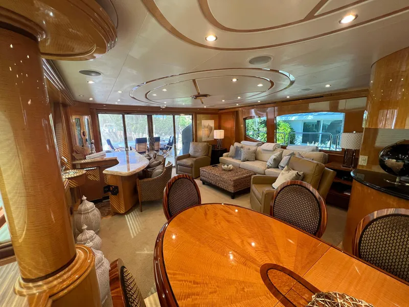 Slide: The Image of Luxurious interior of 2004 Hatteras 80 Motor Yacht with elegant furnishings and spacious layout. - 8