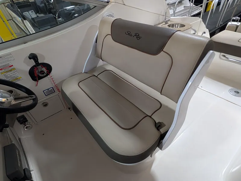 Slide: The Image of 2015 Sea Ray 280 Sundancer boat interior seating, beige upholstery. - 20