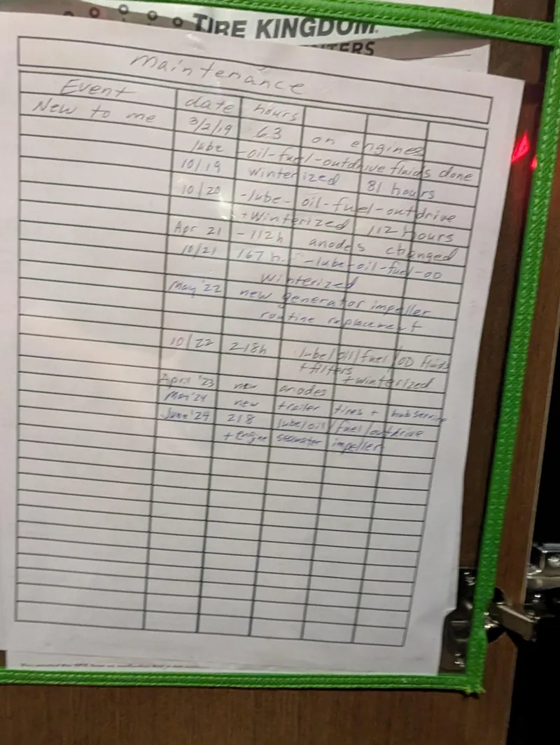 Slide: The Image of Maintenance log for 2015 Sea Ray 280 Sundancer, handwritten on a clipboard. - 22
