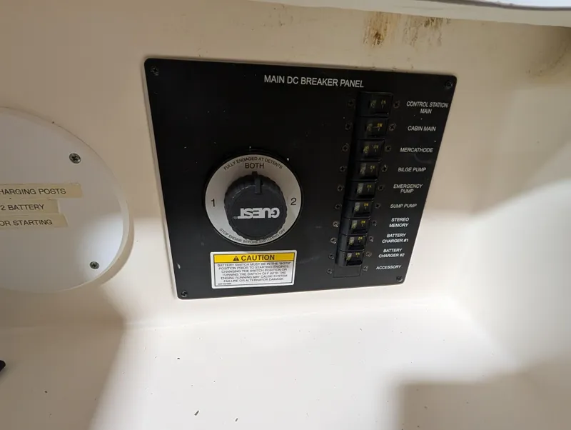 Slide: The Image of Main DC breaker panel on 2015 Sea Ray 280 Sundancer boat. - 24