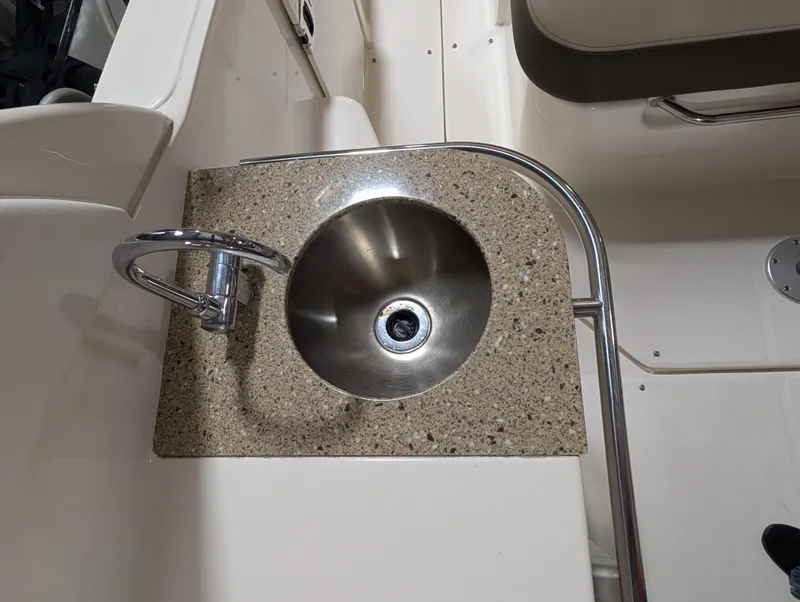 Slide: The Image of Stainless steel sink on 2015 Sea Ray 280 Sundancer boat with granite countertop. - 27