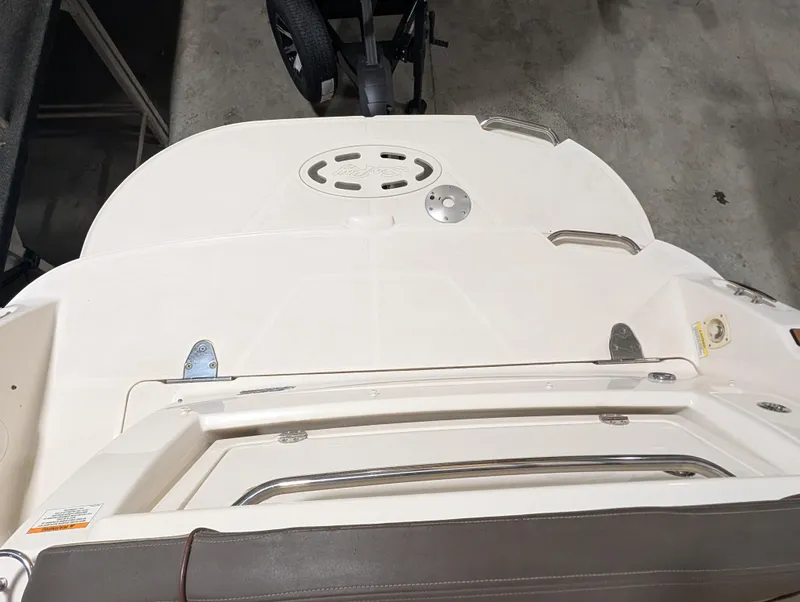 Slide: The Image of 2015 Sea Ray 280 Sundancer boat deck, featuring sleek design and modern fittings. - 28