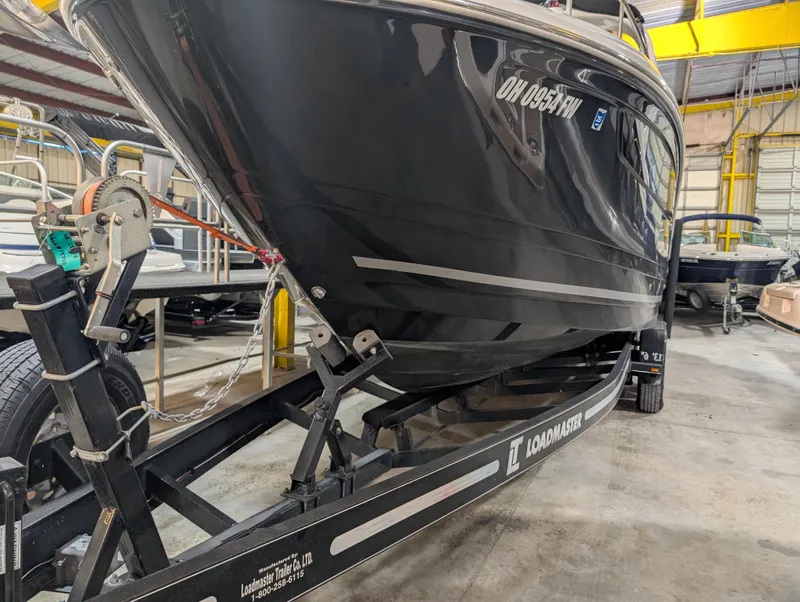 Slide: The Image of 2015 Sea Ray 280 Sundancer on Loadmaster trailer in a storage facility. - 38