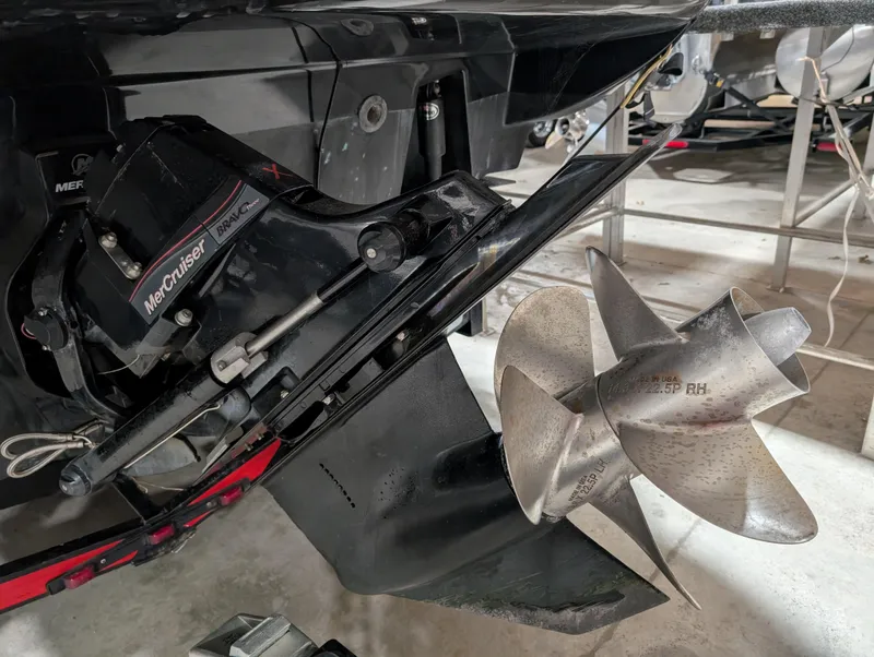 Slide: The Image of Close-up of 2015 Sea Ray 280 Sundancer MerCruiser propeller and drive system. - 43