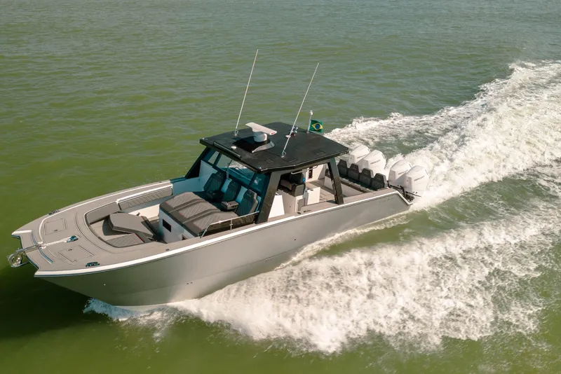 The Image of 2025 Sedna 370 Side Console boat cruising on open water. - 1