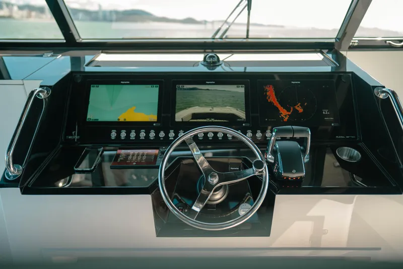 Slide: The Image of Sedna 370 Side Console 2025 dashboard with advanced navigation screens and controls. - 4