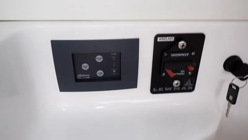 Slide: The Image of Control panel of 2024 Statement 350 Open boat with key and waterproof switch. - 11
