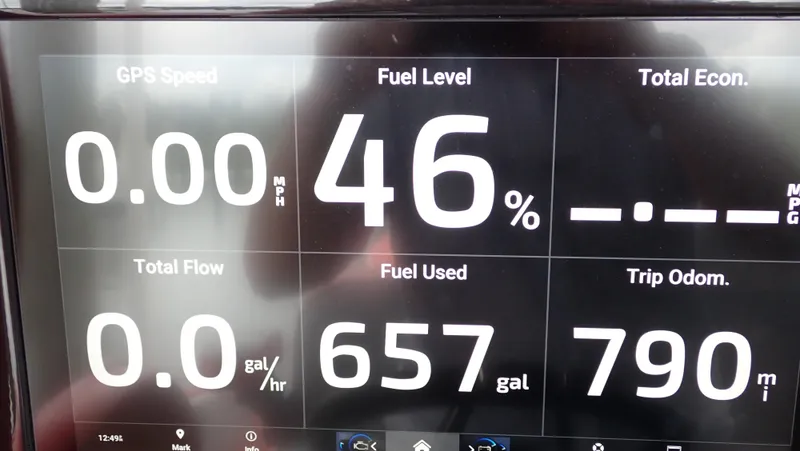 Slide: The Image of Dashboard display of 2024 Statement 350 Open showing fuel level, speed, and trip data. - 22
