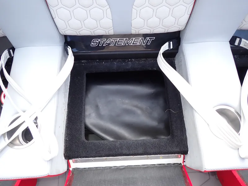 Slide: The Image of 2024 Statement 350 Open boat seating with storage compartment and cup holders. - 29
