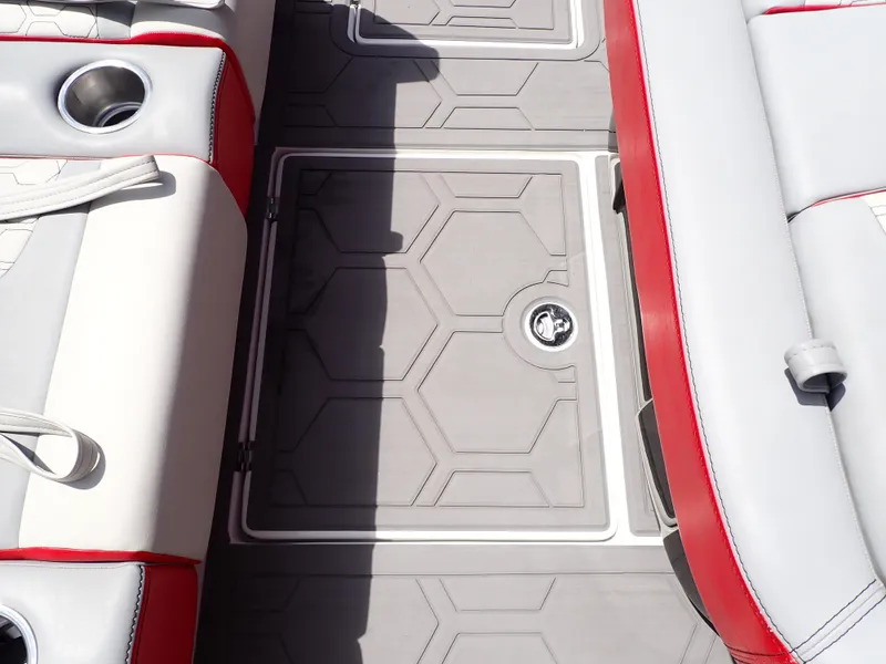Slide: The Image of 2024 Statement 350 Open boat interior with red and white seating and hexagonal floor design. - 37