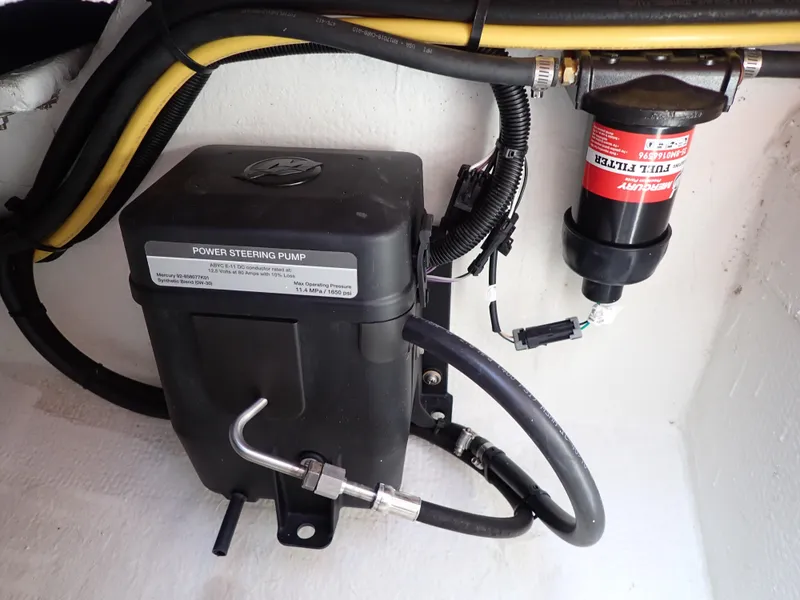 Slide: The Image of Power steering pump and filter system in 2024 Statement 350 Open boat. - 39