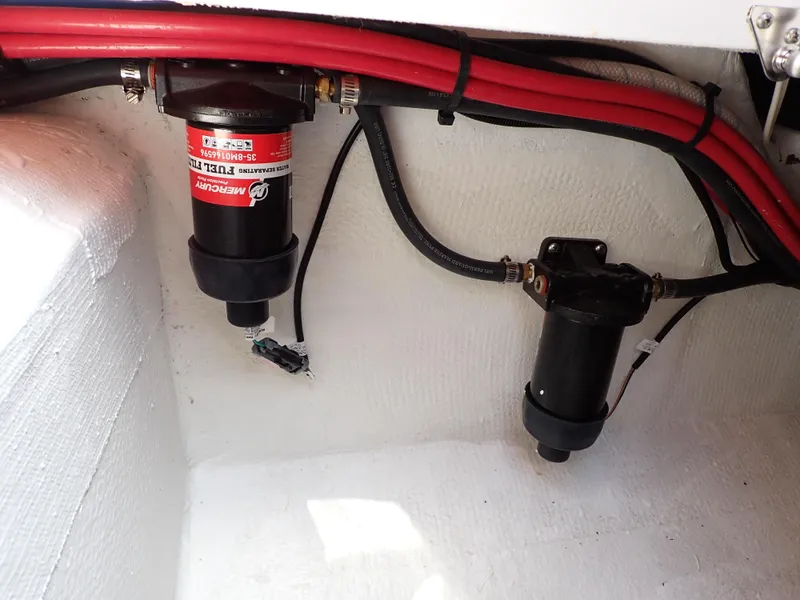 Slide: The Image of 2024 Statement 350 Open boat wiring and components in engine compartment. - 40