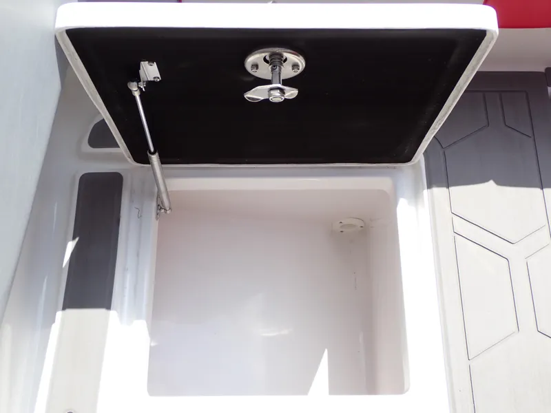 Slide: The Image of 2024 Statement 350 Open storage compartment with open lid and hydraulic support. - 42