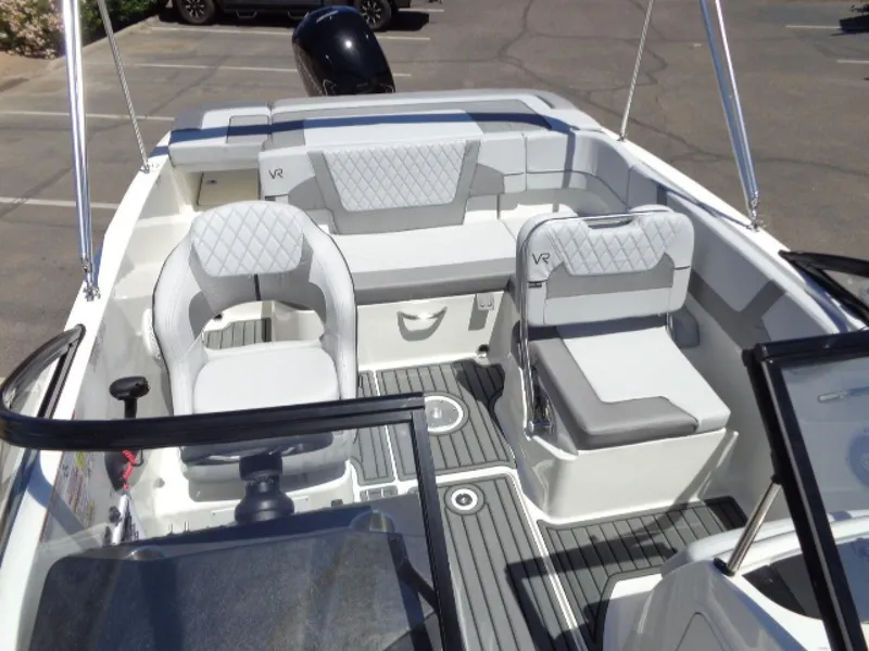 Slide: The Image of 2023 Bayliner VR5 Bowrider OB interior with modern seating and sleek design. - 10