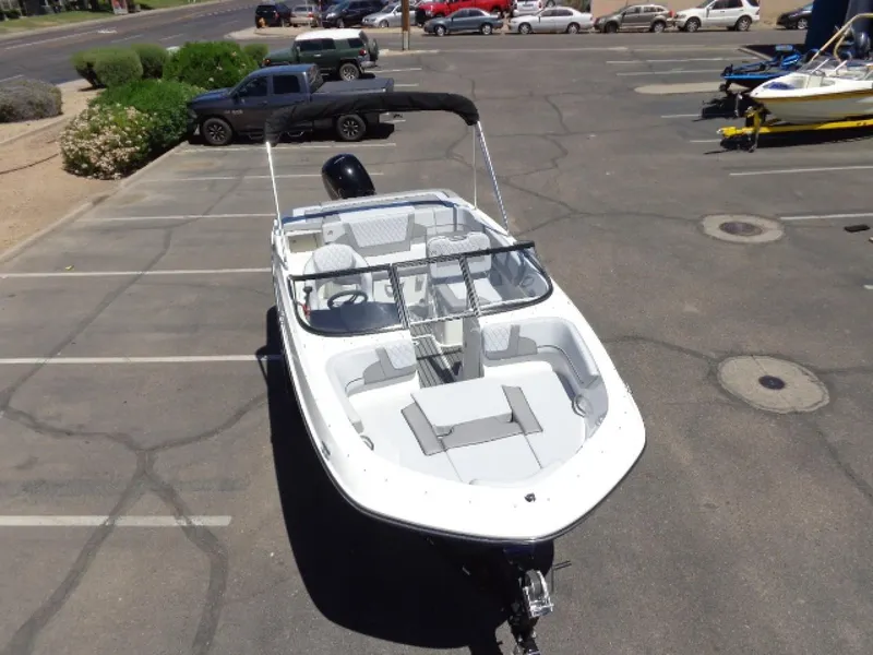 Slide: The Image of 2023 Bayliner VR5 Bowrider OB in parking lot, top view. - 11