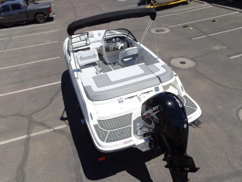 Slide: The Image of 2023 Bayliner VR5 Bowrider OB with Mercury outboard in parking lot. - 8