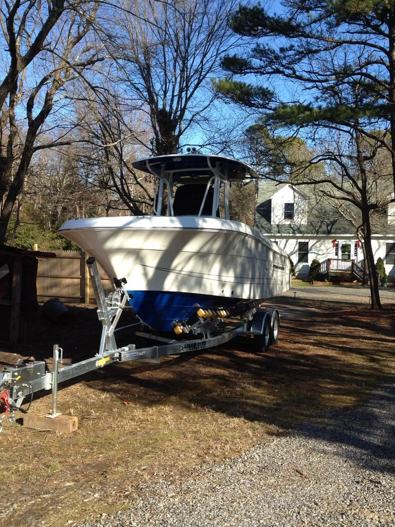 Slide: The Image of 2012 Hydra-Sports 2500 CC boat on trailer in residential driveway. - 4