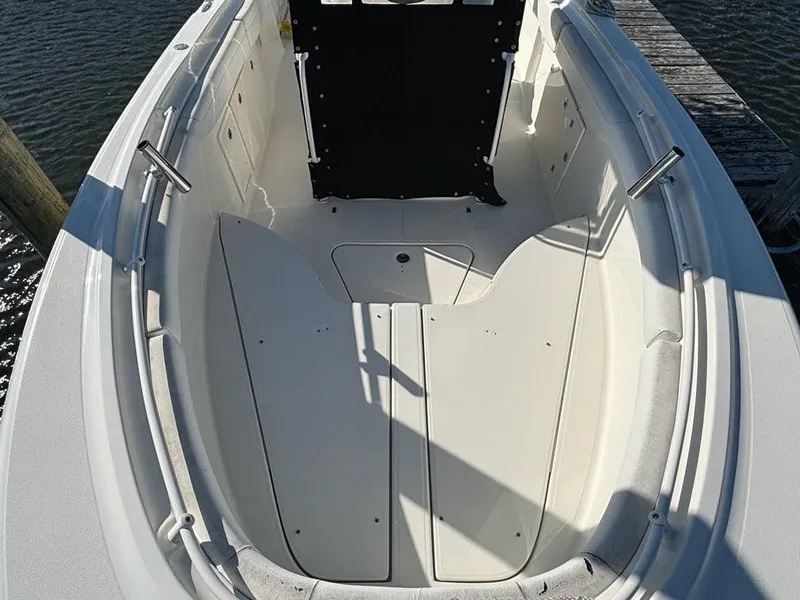 Slide: The Image of 2012 Hydra-Sports 2500 CC boat interior with spacious seating and storage. - 5