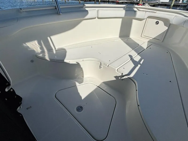 Slide: The Image of 2012 Hydra-Sports 2500 CC boat interior with spacious seating and storage. - 7